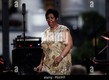 ***FILE PHOTO*** R&B LEGEND ARETHA REPORTEDLY GRAVELY ILL AND SURROUNDED BY FAMILY IN DETROIT HOSPITAL Herbie Hancock (unseen) and Aretha Franklin perform at the International Jazz Day Concert on the South Lawn of the White House, in Washington, DC, April 29, 2016. United States President Barack Obama delivered remarks to introduce the event. Credit: Aude Guerrucci/Pool via CNP/MediaPunch Stock Photo