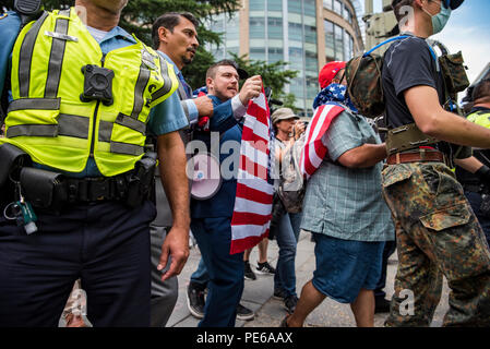 Washington, DC, USA. 12th Aug 2018. White Supremecists march from Foggy Bottom Metro station to Lafayette Park in Washington, DC. The rally, organized by Jason Kessler, was held on the anniversary of the death of Heather Heyer, who was killed during the first Unite the Right Rally in Charlottesville, VA. Credit: Christopher Evens/Alamy Live News Stock Photo