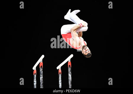 Glasgow, Scotland, UK. 12th August 2018. HEGI Oliver (SUI) competes on the Parallel Bars in Men's Artistic Gymnastics Apparatus Finals during the European Championships Glasgow 2018 at The SSE Hydro on Sunday, 12  August 2018. GLASGOW SCOTLAND. Credit: Taka G Wu Stock Photo
