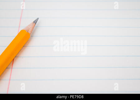 Back to school, education concept - orange pencils close up and composition book on background for educational new academic year begin or study term Stock Photo