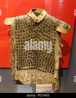 Armor with coins, Tlingit, collected in Alaska in mid 1800s, hide, puffin beaks, Chinese coins from 1644-1796 - Native American Stock Photo