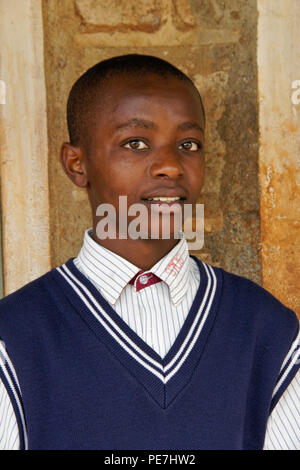 Portrait of teenage boy in secondary school (high school) uniform, Kenya Stock Photo