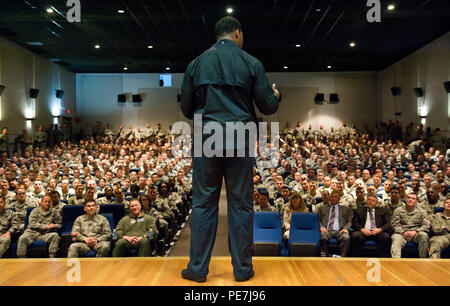 Speaking to a standing-room-only audience, former NFL running back and 1982 Heisman Trophy winner Herschel Walker speaks to military and civilian Airmen of Team Dover on Wingman Day Oct. 14, 2015, at the base theater on Dover Air Force Base, Del. Walker, who was diagnosed with Dissociative Identity Disorder, shared his own personal experience and treatment by seeking help through behavioral health services. In partnership with the Patriot Support Program and part of the program’s anti-stigma campaign message, he emphasized to those in attendance that it is OK to ask for help. (U.S. Air Force p Stock Photo