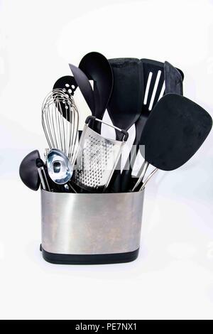 Miscellaneous kitchen utensils in silver container Stock Photo