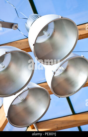 metal lamps in modern glass cieling Stock Photo