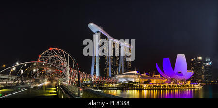 Panoramic view of Marina Bay Singapore under the Helix Bridge, you could see Art Science Museum, Marine Bay Sands and Skyscrapers in the background. Stock Photo