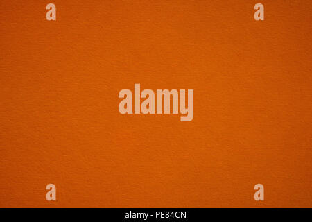 Dark orange paper close up. Large macro background and texture Stock Photo