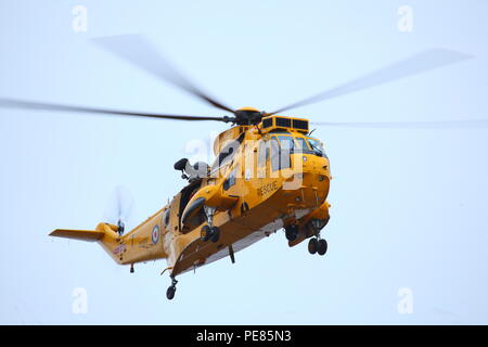 A Sea King helicopter on a training exercise in Filey, North Yorkshire. Stock Photo