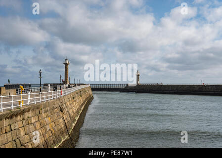East and West Pier at Whitby on the coast of North Yorkshire, England. Stock Photo