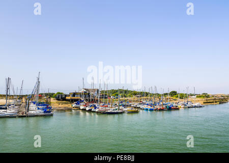 Yachts moored at Arun Yacht Club marina in the estuary of the River Arun, Littlehampton, a small south coast holiday resort in West Sussex in summer Stock Photo