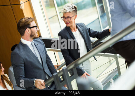 Picture of business colleagues talking in office Stock Photo