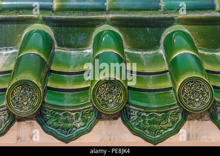 Georgetown, Penang, Malaysia - August 23, 2013: Old roof of Chinese temple with beautiful green glazed tile pattern at the Seh Tek Tong Cheah Kongsi t Stock Photo