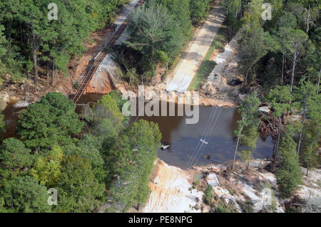 Flood damage seen during a visit by Army Gen. Frank Grass, chief, National Guard Bureau, and Air Force Chief Master Sgt. Mitchell Brush, senior enlisted adviser to the chief of the National Guard Bureau, to assess the National Guard response in support of civil authorities to severe flooding in South Carolina, Oct. 13, 2015. (U.S. Army National Guard photo by Sgt. 1st Class Jim Greenhill) (Released) Stock Photo