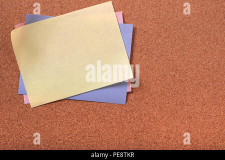 Yellow sticky post note various colors cork background copy space Stock Photo