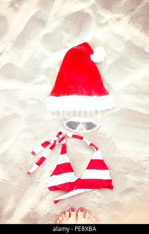Christmas Concept, Summer holiday background, Beach accessories on sand Stock Photo