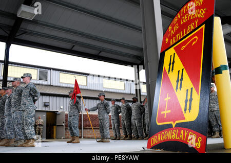 Soldiers assigned to 5th Battalion, 5th Air Defense Artillery Regiment, 31st Air Defense Artillery Brigade, stand at parade rest during a deployment ceremony on Joint Base Lewis-McChord, Wash., Nov. 9, 2015. The “Dragon Slayers,” which fall under 17th Field Artillery Brigade while assigned to JBLM, are deploying a small contingent of the unit in support of U.S. Central Command conducting operations in Southwest Asia. (U.S. Army photos by Sgt. 1st Class Andrew Porch, 28th Public Affairs Detachment) Stock Photo