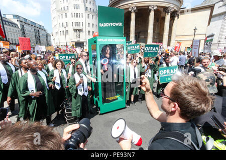 A large gospel choir brings the noise to the anti-Trump protest, delivering a potential saviour in the shape of Oprah Winfrey, as Paddy Power slash the talk show host's Presidential odds to 20/1. 'Oprahtic' were in full voice as they wheeled a lifelike waxwork of Winfrey through the march, following a survey in which 71% of Brits said they would like her to run.  Featuring: Atmosphere Where: London, United Kingdom When: 13 Jul 2018 Credit: Joe Pepler/PinPep/WENN.com Stock Photo