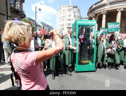 A large gospel choir brings the noise to the anti-Trump protest, delivering a potential saviour in the shape of Oprah Winfrey, as Paddy Power slash the talk show host's Presidential odds to 20/1. 'Oprahtic' were in full voice as they wheeled a lifelike waxwork of Winfrey through the march, following a survey in which 71% of Brits said they would like her to run.  Featuring: Atmosphere Where: London, United Kingdom When: 13 Jul 2018 Credit: Joe Pepler/PinPep/WENN.com Stock Photo