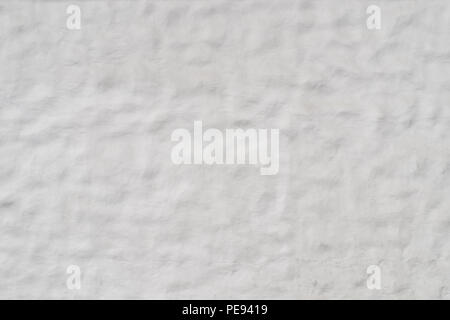 White embossed, rusticated, ashlar wall Stock Photo