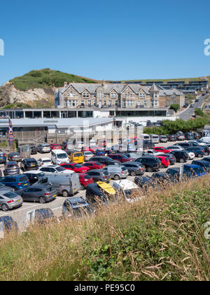Packed , busy, crowded beach car parks at Watergate Bay near Newquay Cornwall UK in the hot summer of 2018 Stock Photo