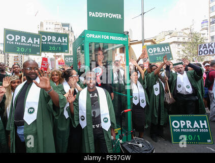 A large gospel choir brings the noise to the anti-Trump protest, delivering a potential saviour in the shape of Oprah Winfrey, as Paddy Power slash the talk show host's Presidential odds to 20/1. 'Oprahtic' were in full voice as they wheeled a lifelike waxwork of Winfrey through the march, following a survey in which 71% of Brits said they would like her to run.  Featuring: Atmosphere Where: London, United Kingdom When: 13 Jul 2018 Credit: Joe Pepler/PinPep/WENN.com Stock Photo