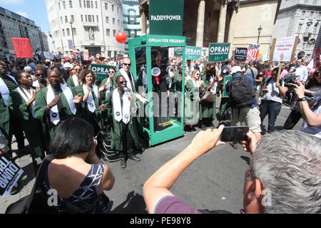 A large gospel choir brings the noise to the anti-Trump protest, delivering a potential saviour in the shape of Oprah Winfrey, as Paddy Power slash the talk show host's Presidential odds to 20/1. 'Oprahtic' were in full voice as they wheeled a lifelike waxwork of Winfrey through the march, following a survey in which 71% of Brits said they would like her to run.  Featuring: Atmosphere Where: London, United Kingdom When: 13 Jul 2018 Credit: Joe Pepler/PinPep/WENN.com Stock Photo