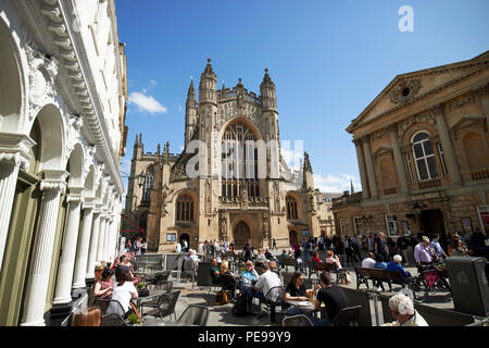 street cafes in busy abbey churchyard leading to bath abbey Bath England UK Stock Photo