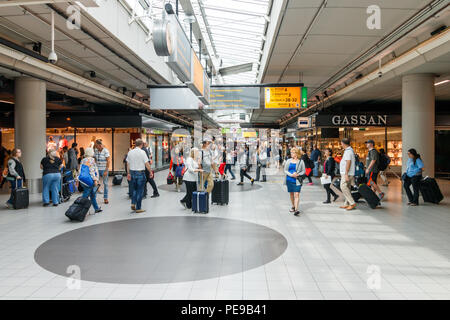 Amsterdam, Netherlands - June 01, 2018: People At Schiphol Airport Stock Photo