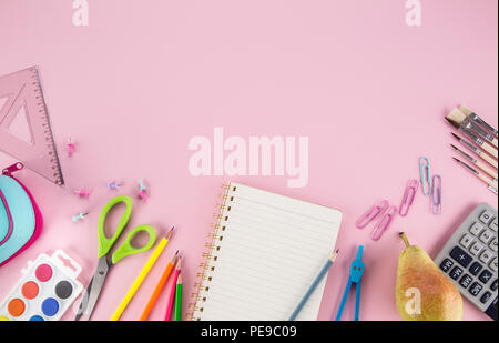 School supplies with copy space on pink background. Stock Photo