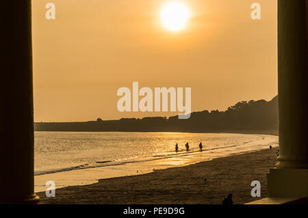 Group of friends riding their horses in the sea at Barry Island, Vale of Glamorgan, Wales. PHILLIP ROBERTS Stock Photo