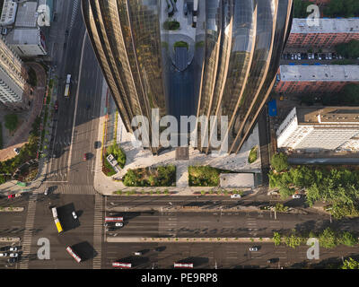 View down the front of the twin towers of Chaoyang Park Plaza. Chaoyang Park Plaza, Beijing, China. Architect: MAD Architects, 2017. Stock Photo