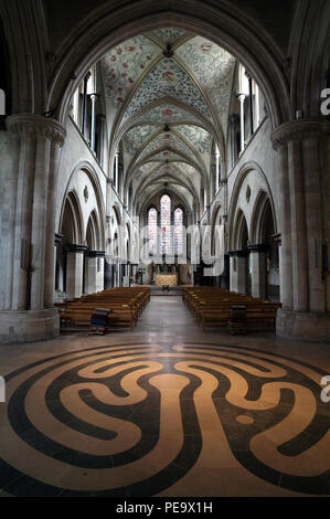 The interior of the Church of St Mary and St Blaise, Boxgrove, with prominent labyrinth in Purbeck stone floor. Stock Photo