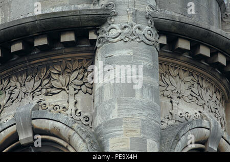 Close up of the stonework details on the clock tower of the Horniman Museum, Forest Hill, South London - a rare example of English Art Nouveau. Stock Photo
