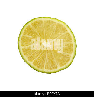 Close up one round thin cut slice of fresh green lime fruit, backlit and isolated on white background Stock Photo
