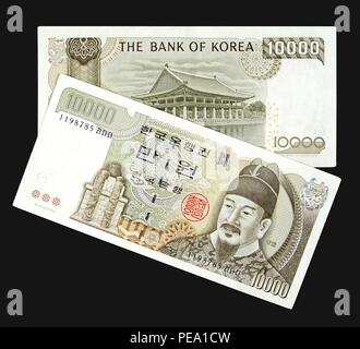 South Korean 10,000 Won banknote with depictions of King Sejong the Great on the obverse side and Kyonghoeru Pavillion on the reverse side. Stock Photo