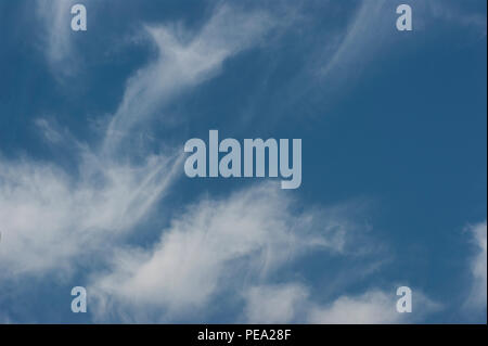 Stratus floccus Clouds in the middle of the day on the sky. Stock Photo
