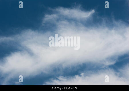 Stratus floccus Clouds in the middle of the day on the sky. Stock Photo
