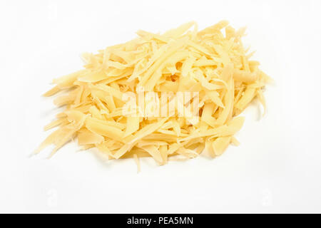 Heap of grated cheese, isolated on white background. Stock Photo