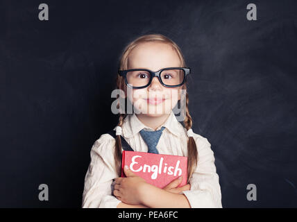 Cute Child Schoolgirl Holding Red Book On Chalkboard Background Speak English And Learn Language Concept Stock Photo Alamy