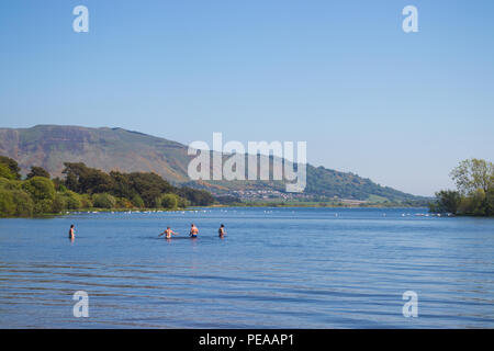 People swimming in Loch Leven Fife Scotland. Stock Photo