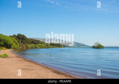 People swimming in Loch Leven Fife Scotland. Stock Photo