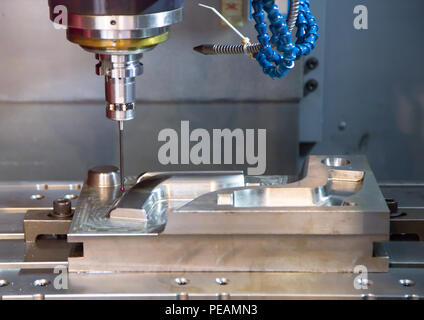 Industry machining measured dimension of workpiece on milling machine Stock Photo
