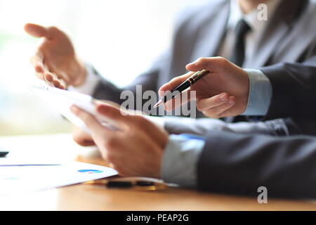 close up.business partners to analyze financial data Stock Photo