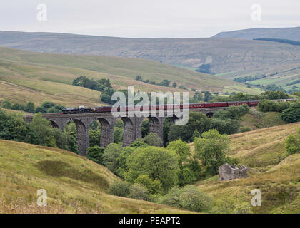 LMS Jubilee Class 5690 Leander crossing Dent Head Viaduct, Settle Carlisle Line as 1T57 on 50 anniversary of last steam hauled mainline train Stock Photo