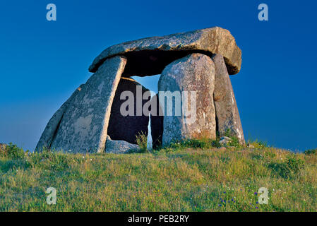 Prehistoric dolmen on a hill with blue sky Stock Photo