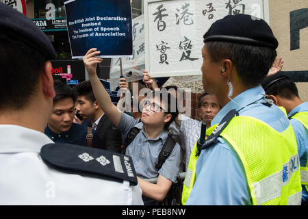 Hong Kong, Hong Kong SAR. 14th Aug, 2018. Leader of the soon to be banned National Party of Hong Kong, Andy Chan Ho-Tin speaks to the Foreign Correspondents Club in Central Hong Kong. Protesters from both the pro Independence camp and the Pro-Beijing camp fill the streets outside the club. Credit: Jayne Russell/ZUMA Wire/Alamy Live News Stock Photo