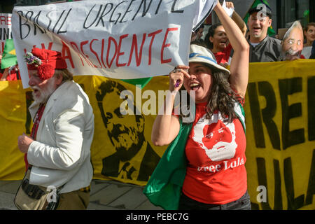 London, UK. 13th August 2018.  Brazilians protest outside the Brazilian embassy calling for the release of Luiz Inacio Lula da Silva, a former trade union leader who was President of Brazil from 2003-11 to enable him to stand for election again in October. Credit: Peter Marshall/Alamy Live News Stock Photo