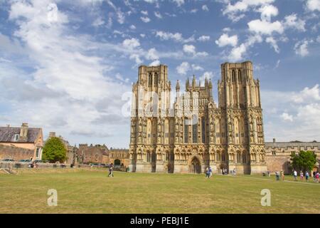 Wells Cathedral, West Front, Blue sky with fluffy clouds. Stock Photo