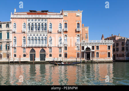 Palazzo Barbarigo della Terrazza (right) and Palazzo Pisani Moretto, Grand Canal, San Polo, Venice, Veneto, Italy with reflections on the water. Stock Photo