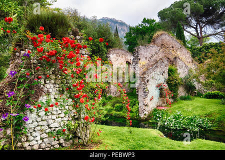 The Ninfa Garden with Historic Ruins and Blooming Flowers, Cisterna di Latina , Lazio,Italy Stock Photo